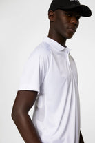 J.Lindeberg Men's Sola golf polo with breathable stretch performance fabric and athletic fit for golf and everyday wear