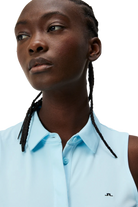 J.Lindeberg Women's Dena sleeveless golf polo with breathable stretch performance fabric and athletic fit for golf and active wear