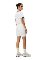 J.Lindeberg Women's Gwen Long golf shorts with breathable stretch performance fabric and extended coverage for golf and active wear