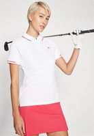 J.Lindeberg Women's Lee golf polo with breathable stretch performance fabric and athletic fit for golf and resort wear