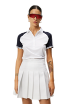 J.Lindeberg Women's Perinne golf polo with breathable stretch performance fabric and athletic fit for golf and resort wear