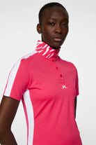 J.Lindeberg Women's Pip golf polo with breathable stretch performance fabric and athletic fit for golf and resort wear
