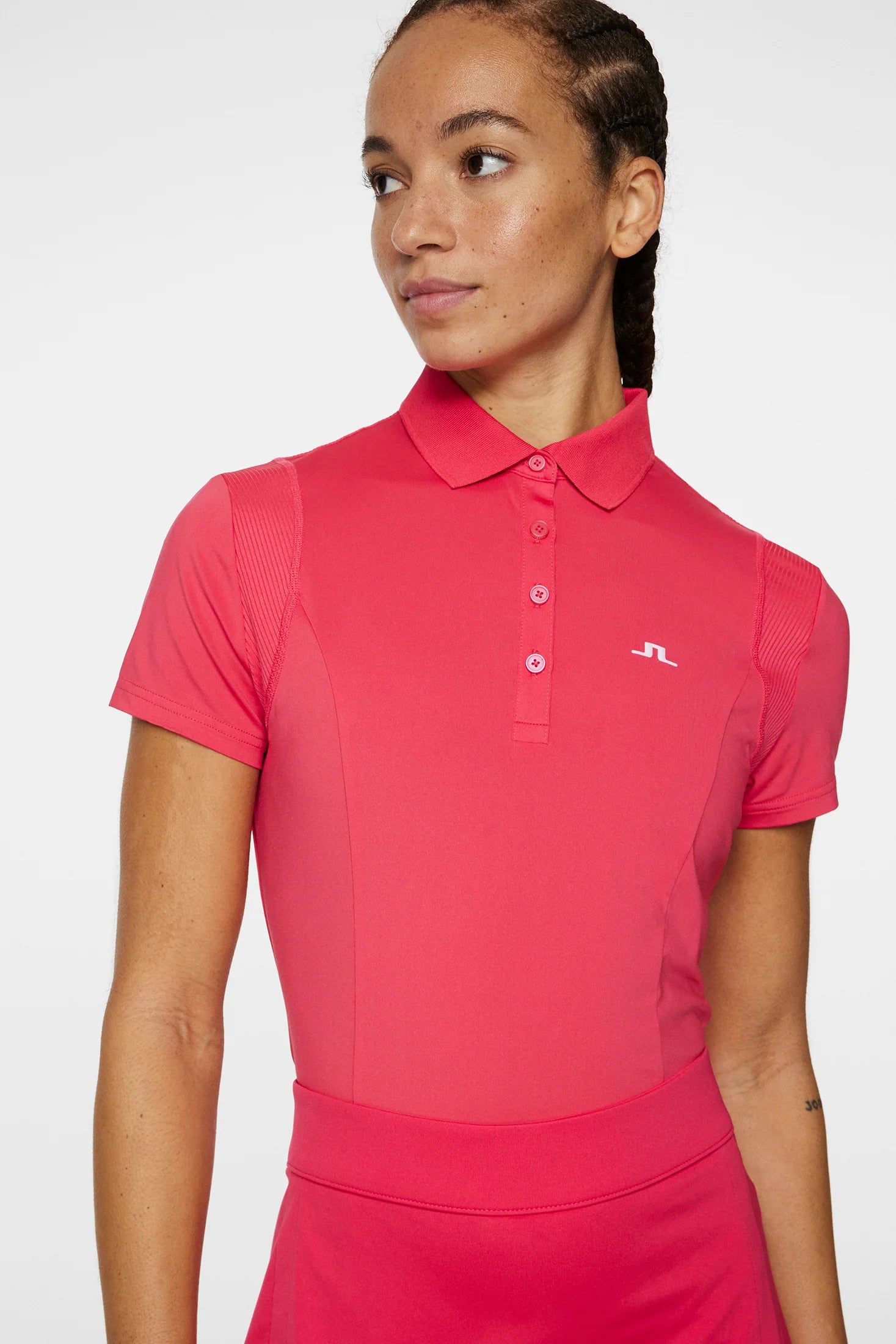 J.Lindeberg Women's Zuri golf polo with breathable stretch performance fabric and flattering athletic fit for golf and resort wear