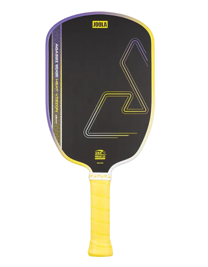 A Joola Agassi Edge Heat Vision pickleball paddle with a black face, yellow and purple trim, and a yellow grip, shown against a light gray background.