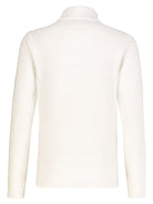 A white Kjus Girls Julie Half Zip Turtleneck midlayer sweater that is stretchable, breathable, and designed to be worn under a ski jacket.