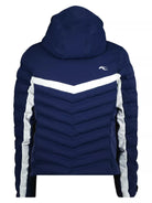 A navy blue Kjus Girls Mila Ski Jacket that features 20K waterproofing and breathability, premium 4-way stretch fabric, a powder skirt, and a detachable hood.