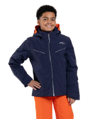 Front view of a blue Kjus Jr Boys’ Formula Jacket featuring 4-way stretch waterproof fabric, Fast Thermo Core insulation, water-repellent zippers, and the KJUS-GROW sleeve extension system.