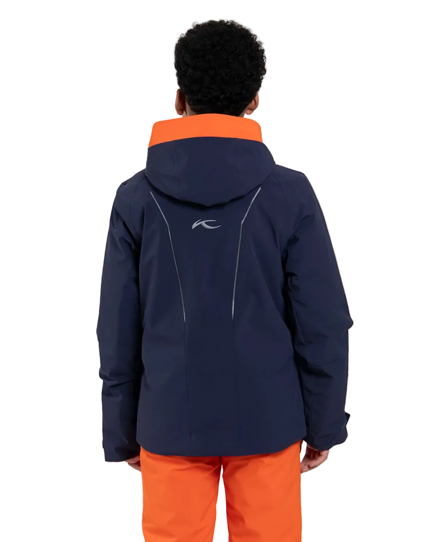 Rear view of a blue Kjus Jr Boys’ Formula Jacket featuring 4-way stretch waterproof fabric, Fast Thermo Core insulation, water-repellent zippers, and the KJUS-GROW sleeve extension system.