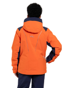 Rear view of an orange Kjus Jr Boys’ Formula Jacket featuring 4-way stretch waterproof fabric, Fast Thermo Core insulation, water-repellent zippers, and the KJUS-GROW sleeve extension system.