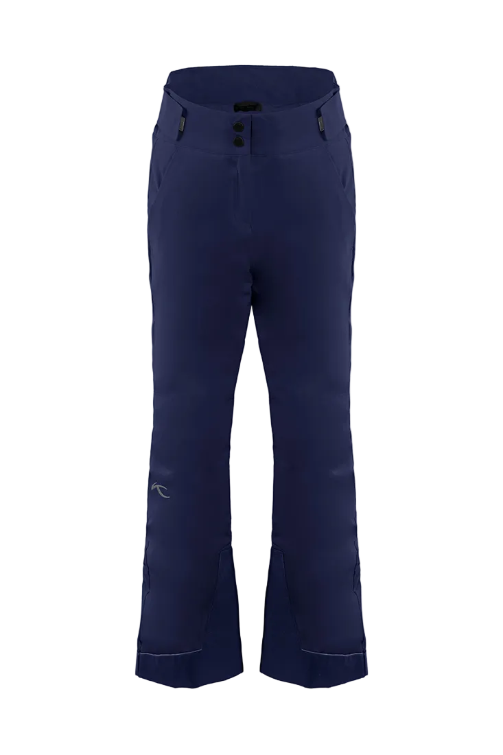 Front view of Atlanta Blue Kjus Jr Girls’ Whiteout Pants featuring 2-layer waterproof fabric, Fast Thermo Core insulation, water-repellent zippers, reinforced scuff guards, and the KJUS-GROW leg extension system.