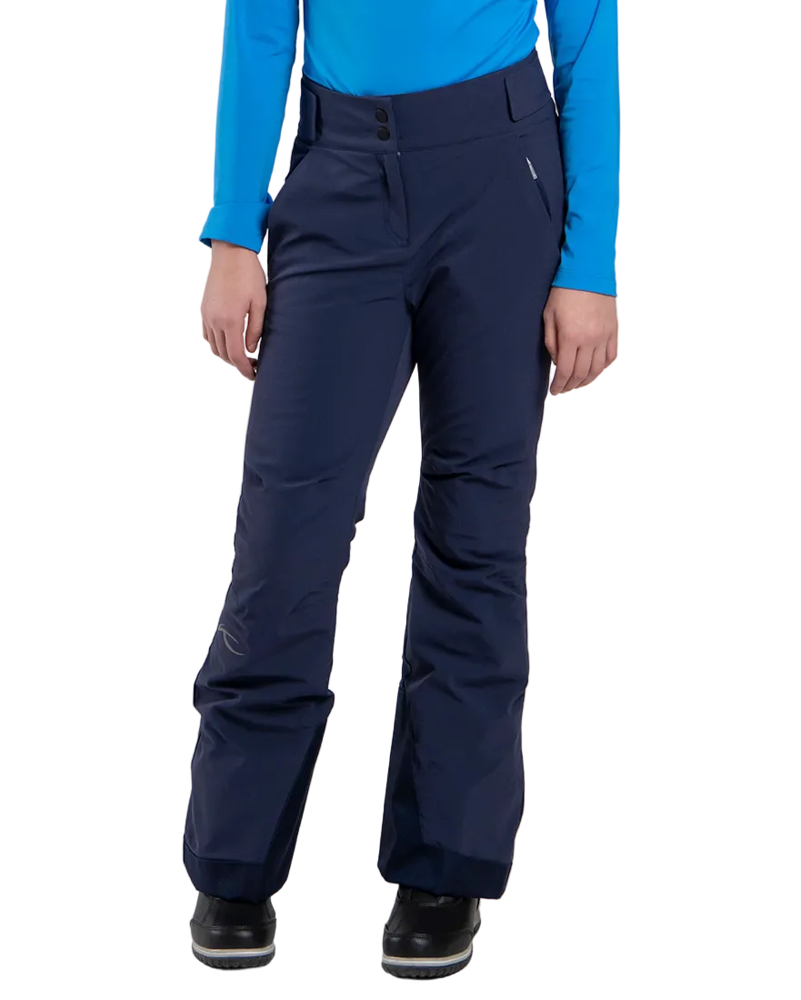 Front view of Atlanta Blue Kjus Jr Girls’ Whiteout Pants featuring 2-layer waterproof fabric, Fast Thermo Core insulation, water-repellent zippers, reinforced scuff guards, and the KJUS-GROW leg extension system.