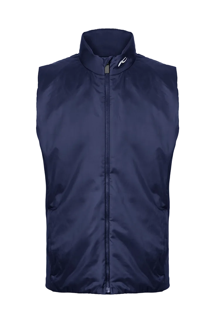 Front view of an Atlanta blue Kjus Jr Radiation Vest featuring windproof water-repellent fabric, synthetic insulation, stretch side panels, and a full-zip front with chin guard.
