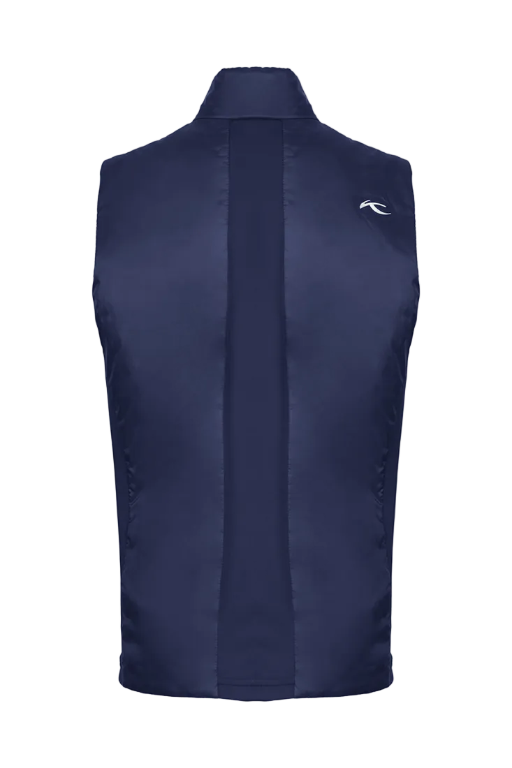 Rear view of an Atlanta blue Kjus Jr Radiation Vest featuring windproof water-repellent fabric, synthetic insulation, stretch side panels, and a full-zip front with chin guard.
