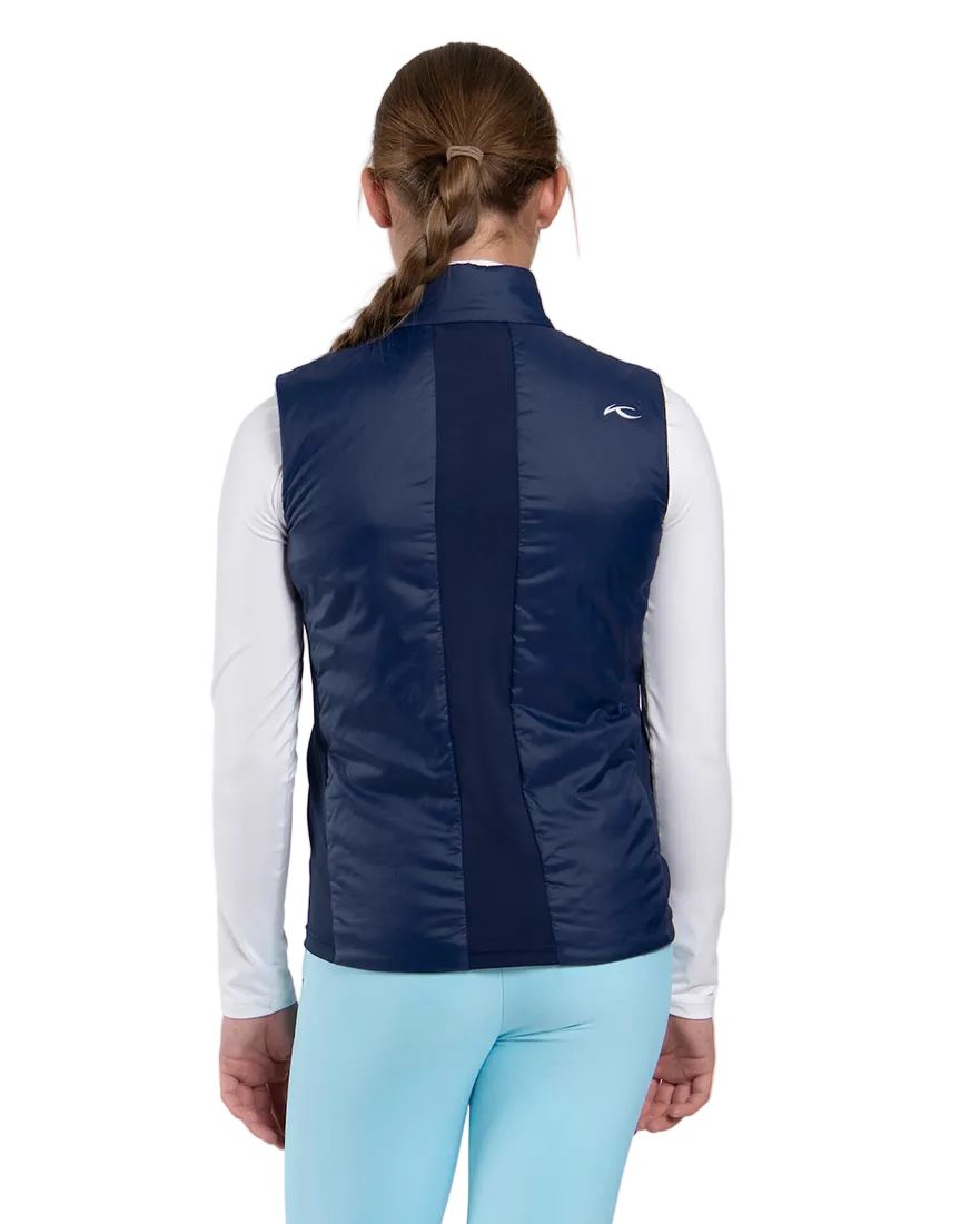 Rear view of an Atlanta blue Kjus Jr Radiation Vest featuring windproof water-repellent fabric, synthetic insulation, stretch side panels, and a full-zip front with chin guard.