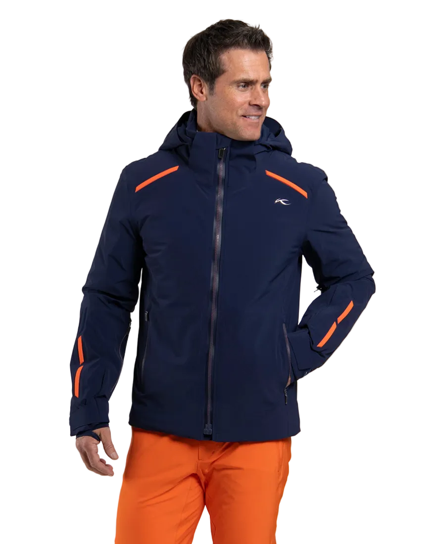 Front view of a navy Kjus Men’s Cirque Jacket featuring 4-way stretch waterproof fabric, zoned down insulation, water-repellent zippers, AC-Vent forearm ports, and a detachable helmet-compatible hood.