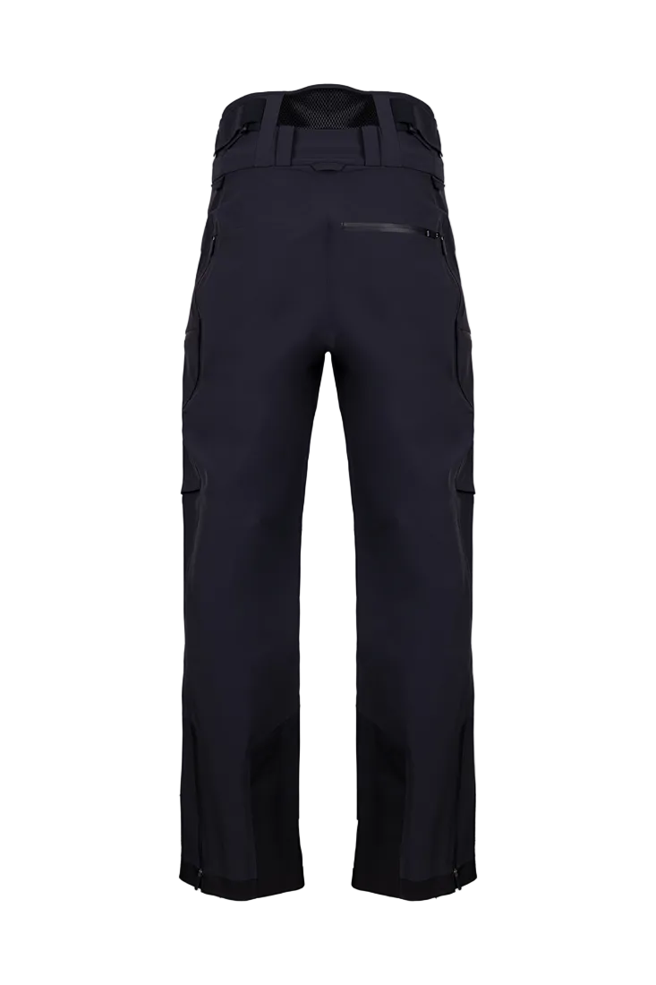 Rear view of black Kjus Men’s FRX Lucas Shell Pants featuring 3-layer waterproof stretch fabric, zippered outer thigh vents, water-repellent zippers, and Schoeller Keprotec reinforced scuff guards.