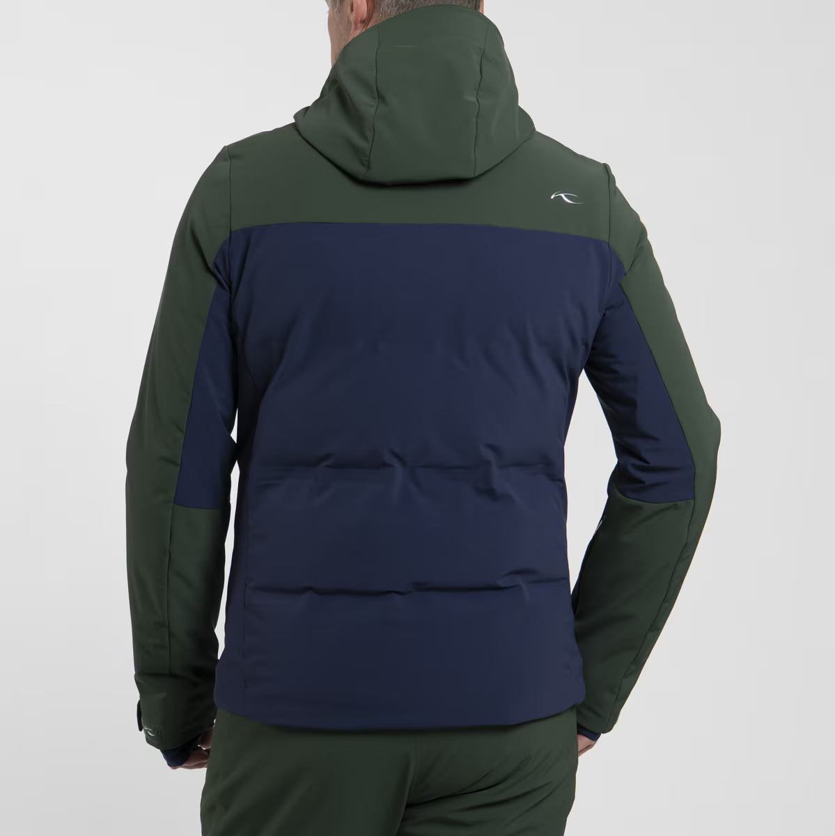 KJUS Men's Green Line 2.0 Ski Jacket featuring waterproof construction, lightweight insulation, four-way stretch fabric, adjustable hood, and premium alpine performance.