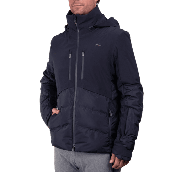 KJUS Men's Pivot Ski Jacket featuring waterproof construction, lightweight insulation, four-way stretch fabric, adjustable hood, and premium alpine performance.