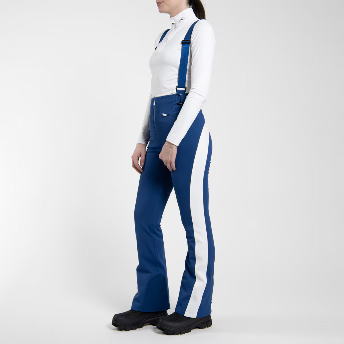 KJUS Women's Core Embrace Ski Pants featuring waterproof construction, lightweight insulation, four-way stretch fabric, articulated knees, and a women's-specific fit.