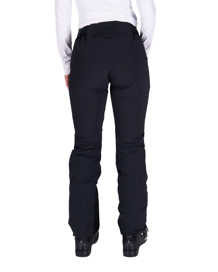 Rear view of black Kjus Women’s Formula Pants featuring 4-way stretch waterproof fabric, Fast Thermo Core insulation, water-repellent zippers, and Schoeller Keprotec reinforced scuff guards.