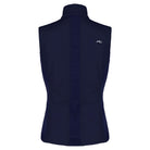 KJUS Women's Radiation Vest featuring lightweight synthetic insulation, stretch side panels, zippered pockets, and a women's-specific fit for skiing and winter layering.