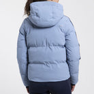 KJUS Women's Twilight Ski Jacket featuring waterproof construction, lightweight insulation, four-way stretch fabric, adjustable hood, and premium alpine performance.
