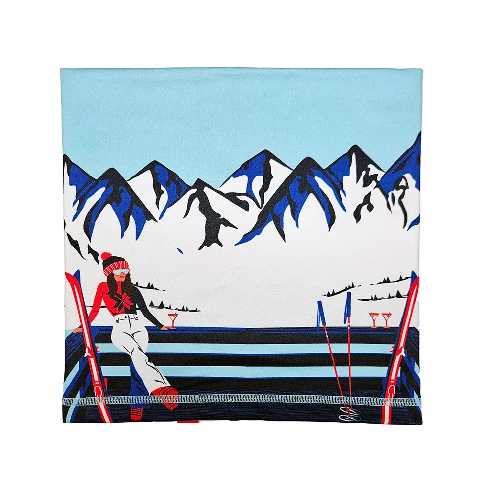 Front view of the Krimson Klover Apres Anyone Neck Gaiter featuring a four-way stretch recycled polyester blend, brushed fleece interior lining, seamless finish, and custom resort graphic print.