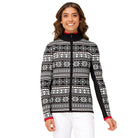 A woman wearing a black and white Krimson Klover Women's Holiday Cardigan Snow that features 4-way stretch, a brethable knit, and a geometric snowflake pattern.