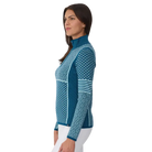 Side view of a teal Krimson Klover Women’s Pow 1/2 Zip Sweater featuring a mid-weight technical stretch knit, deep half-zip front zipper with chin guard, flatlock seams, and graphic print.