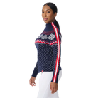 Side view of a navy Krimson Klover Women’s Snowhut 1/2 Zip Sweater featuring a technical four-way stretch knit, tall stand-up collar, deep half-zip front zipper, and flatlock seams.