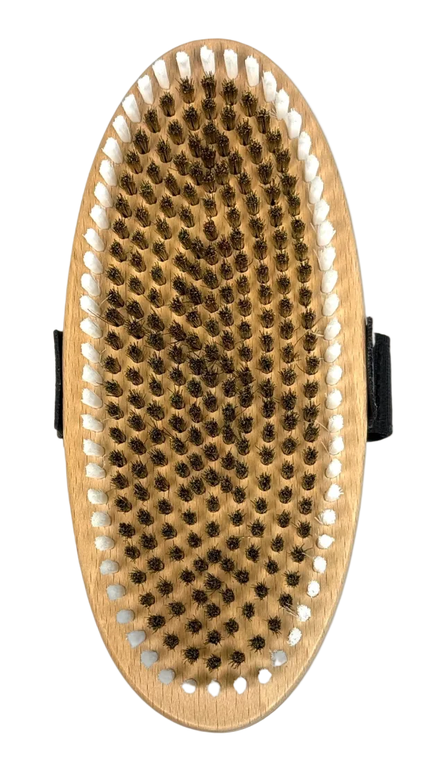 A Kuu Oval Brass Brush showing a curved wooden block base set with fine metallic wire bristles and an adjustable fabric hand strap across the top surface.