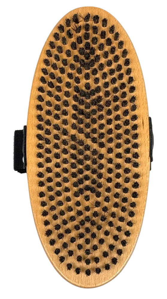 Kuu Oval Horsehair Brush showing a curved wooden block base set with fine natural hair bristles and an adjustable fabric hand strap across the top surface.