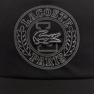 Lacoste Adjustable Unisex Cap featuring a curved brim, adjustable closure, lightweight comfort, and embroidered crocodile logo.