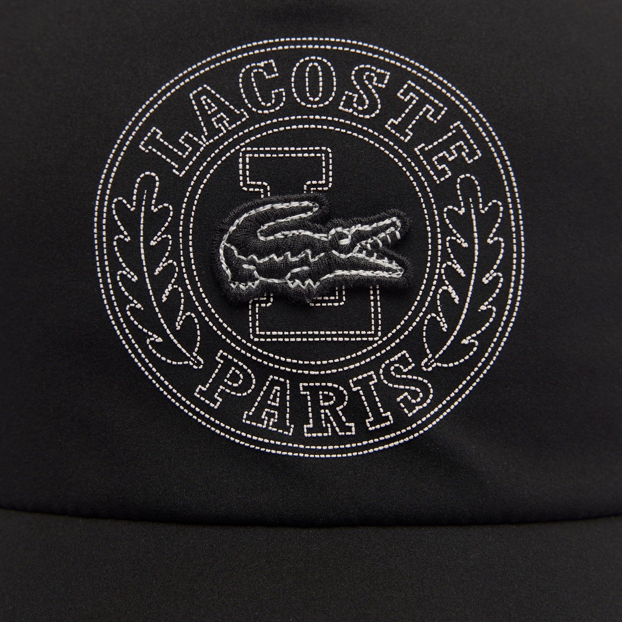 Lacoste Adjustable Unisex Cap featuring a curved brim, adjustable closure, lightweight comfort, and embroidered crocodile logo.