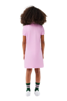Lacoste Girls Cotton Polo Tennis Dress featuring soft cotton fabric, classic polo collar, tennis-inspired styling, and crocodile branding.
