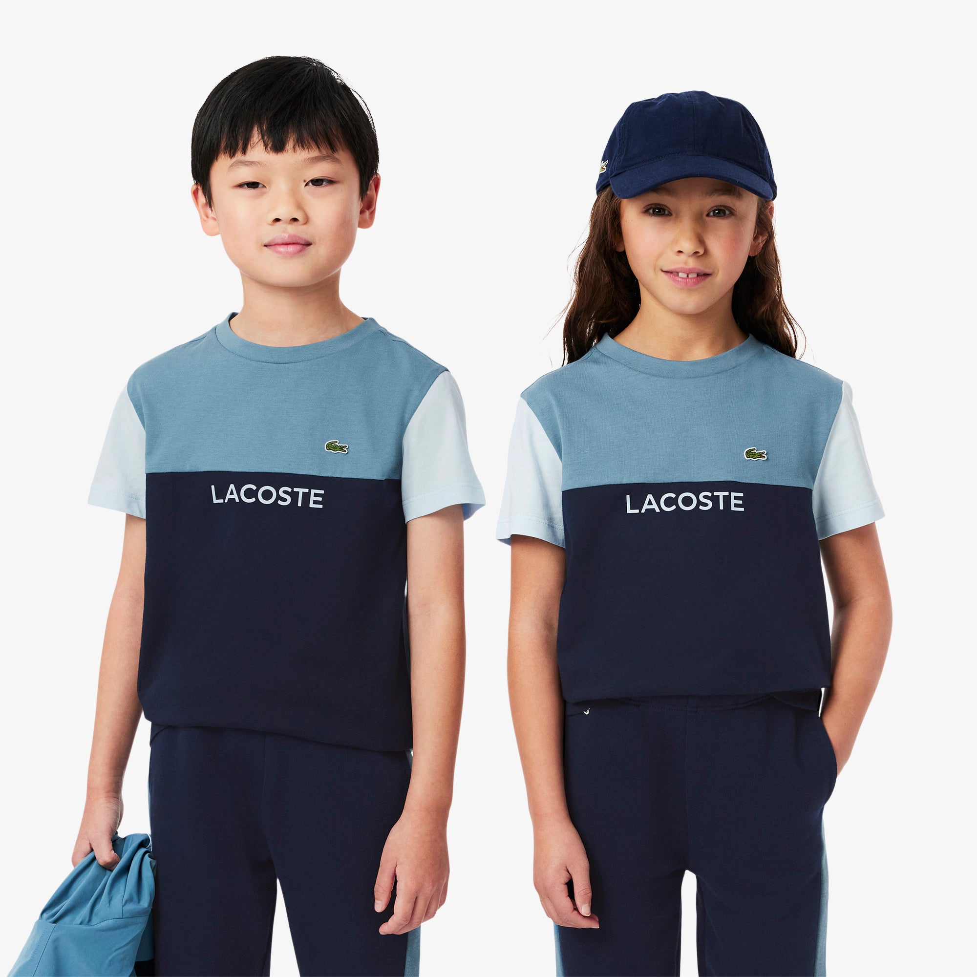 Lacoste Kids Cotton Colorblock T-Shirt featuring soft cotton fabric, colourblock styling, comfortable fit, and crocodile branding.