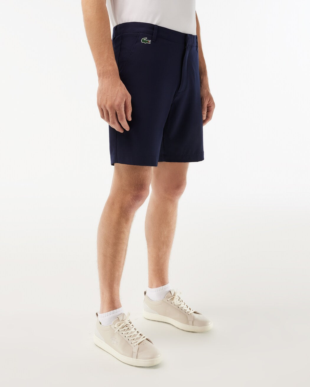 Lacoste Men's Bermuda golf shorts with breathable stretch performance fabric and tailored fit for golf and everyday wear