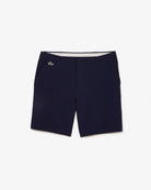 Lacoste Men's Bermuda golf shorts with breathable stretch performance fabric and tailored fit for golf and everyday wear