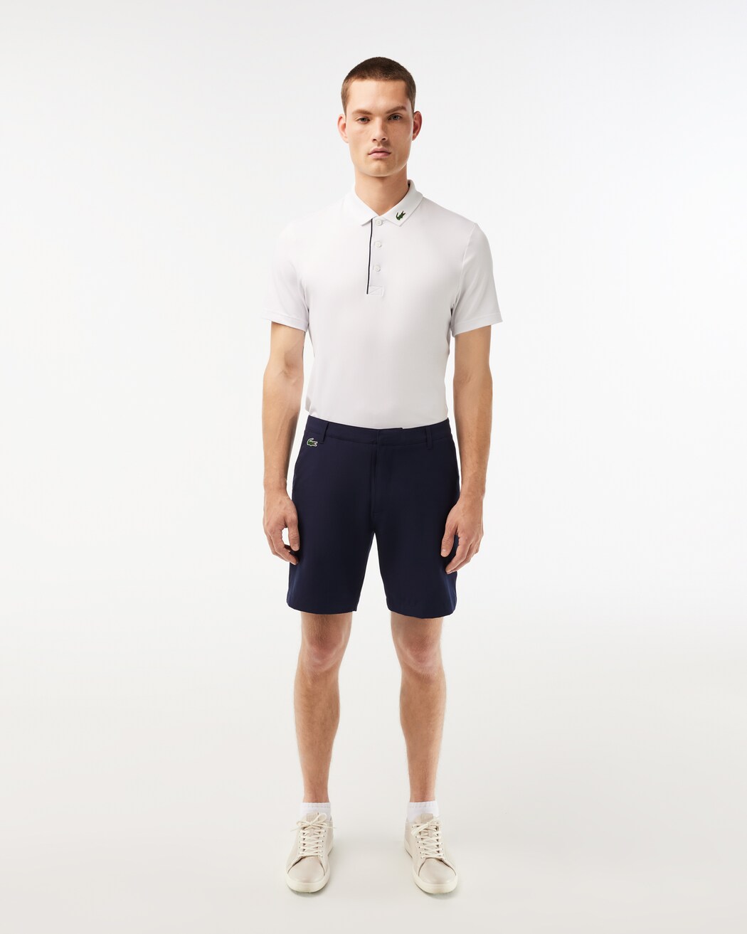 Lacoste Men's Bermuda golf shorts with breathable stretch performance fabric and tailored fit for golf and everyday wear
