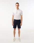 Lacoste Men's Bermuda golf shorts with breathable stretch performance fabric and tailored fit for golf and everyday wear