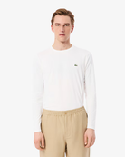 Lacoste Men's Crew Neck Pima Cotton Jersey Long Sleeve T-Shirt featuring premium Pima cotton, soft comfort, classic styling, and crocodile branding.