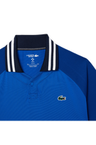 Lacoste Men's x Daniil Medvedev Ultra-Dry Tennis Polo featuring moisture-wicking performance fabric, athletic fit, and signature collection detailing.