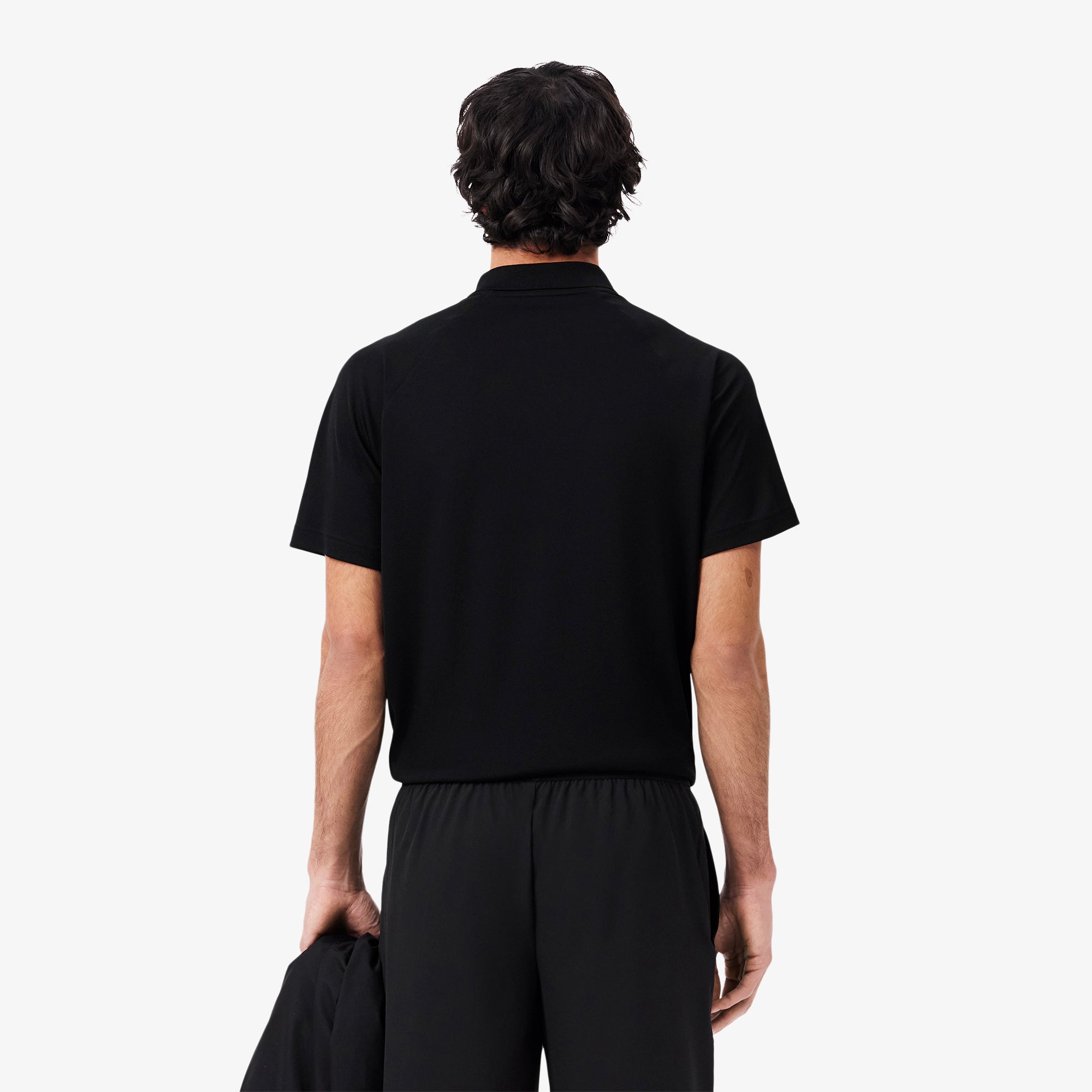 Lacoste Men's Regular Fit UV Protection golf polo with breathable performance fabric and sun protection for golf and outdoor activities