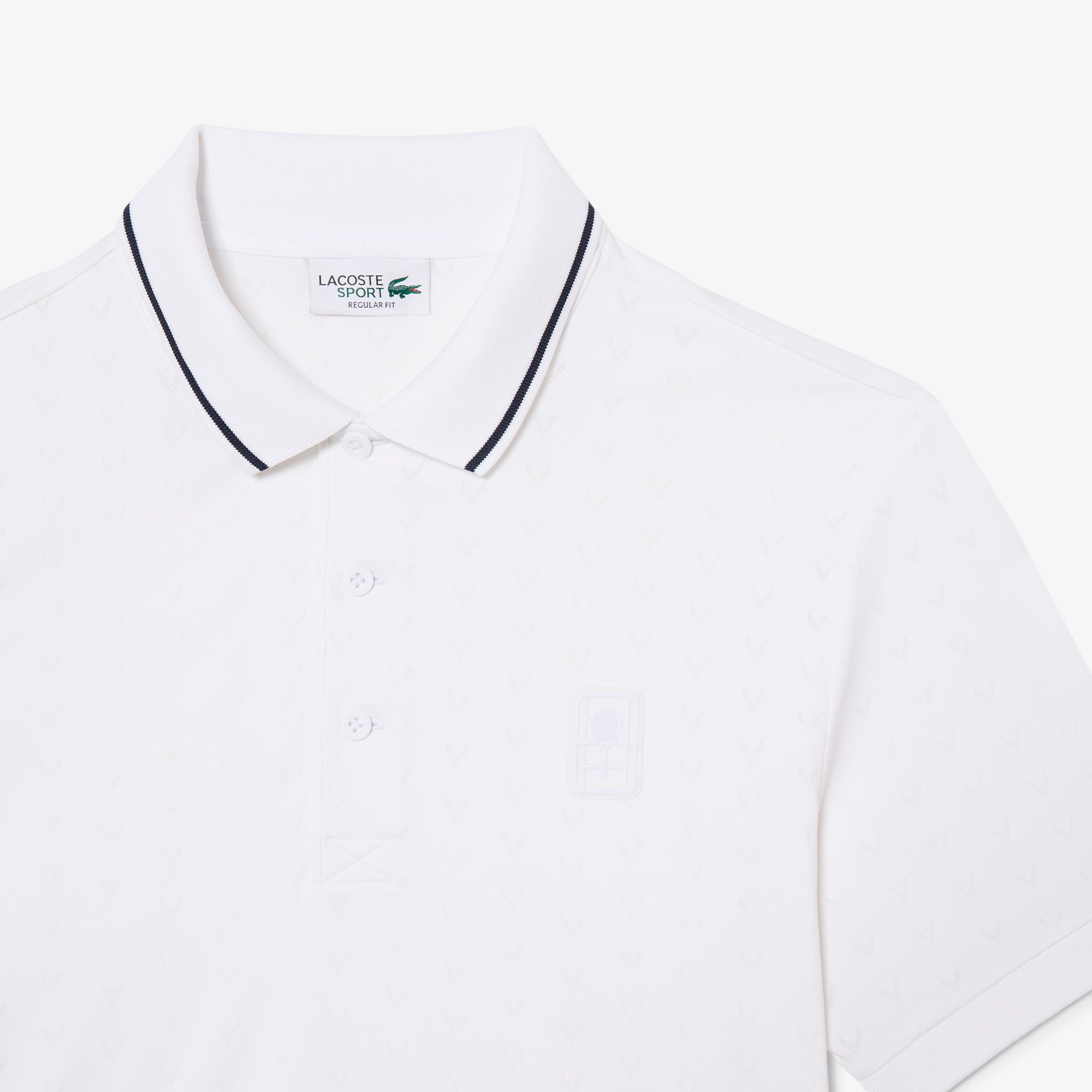 Lacoste Men's Tennis Heritage Ultra Dry Stretch Polo featuring moisture-wicking stretch fabric, heritage styling, and embroidered crocodile branding.