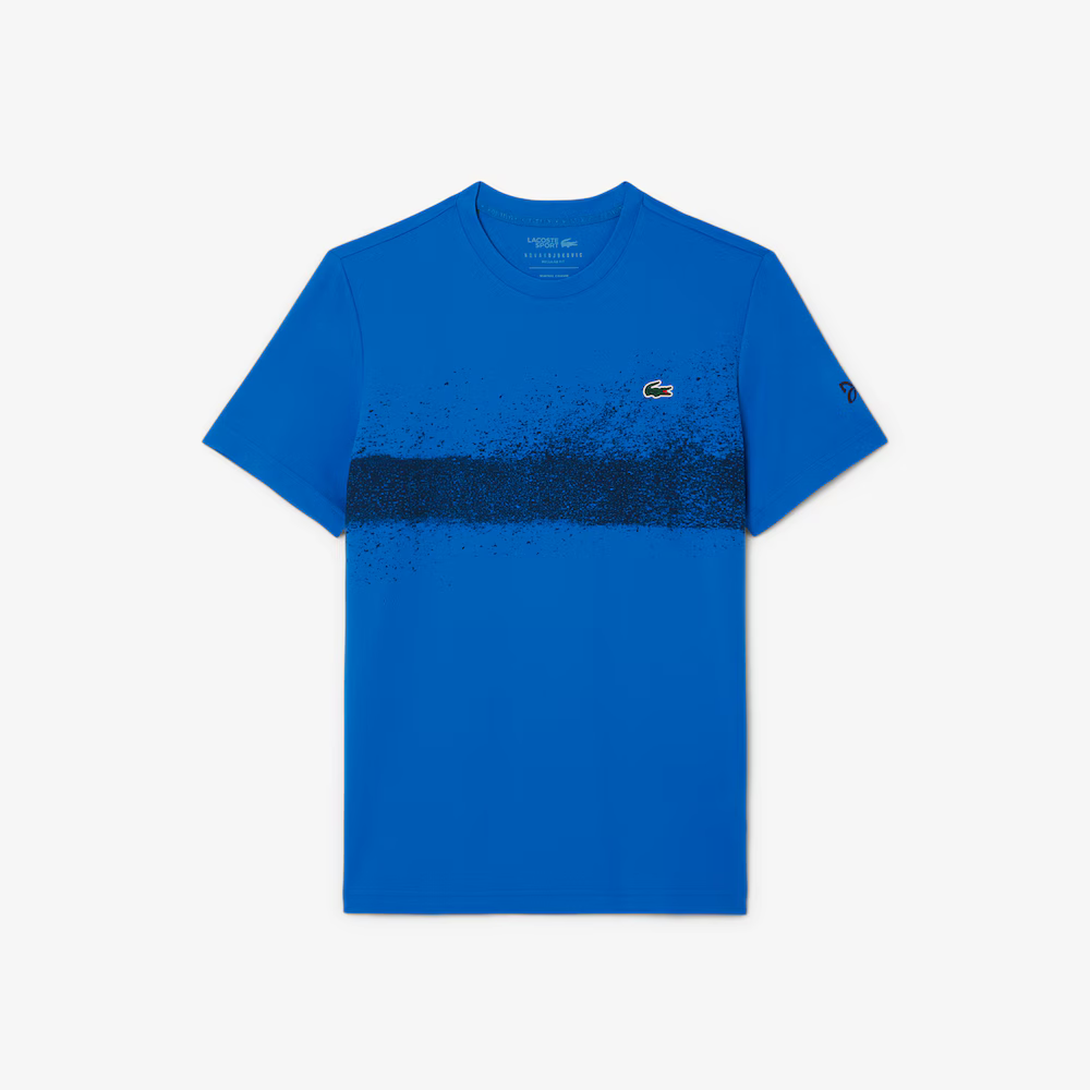 Lacoste Men's Tennis x Novak Djokovic T-Shirt featuring soft breathable fabric, athletic styling, signature graphics, and crocodile branding.
