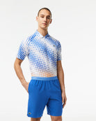 Lacoste Men's Tennis x Novak Djokovic Taffeta Shorts featuring lightweight performance fabric, athletic fit, side pockets, and signature branding.