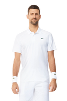 Lacoste Men's Tennis x Novak Djokovic Ultra-Dry Polo featuring moisture-wicking performance fabric, athletic fit, and signature collection styling.