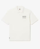 Lacoste Men's Tennis Polo with Ribbed Collar featuring lightweight performance fabric, breathable comfort, and embroidered crocodile branding.