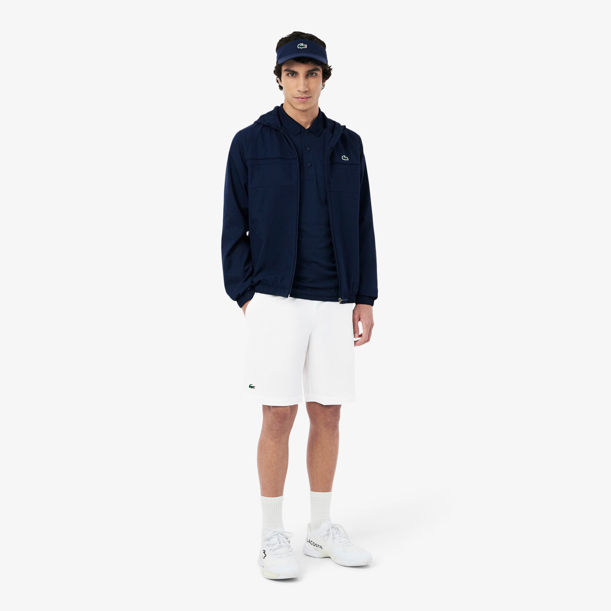 Lacoste Men's Ultra Dry Tennis Shorts featuring moisture-wicking performance fabric, side pockets, athletic fit, and breathable comfort.