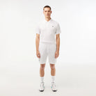 Lacoste Men's Ultralight Tennis Shorts featuring lightweight performance fabric, moisture management, side pockets, and an athletic fit.